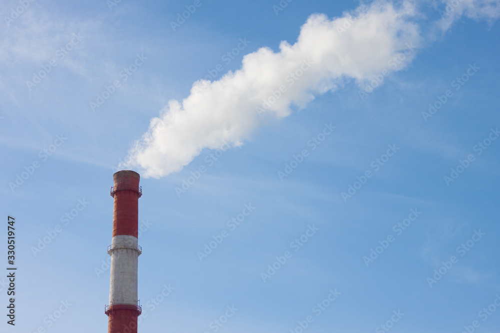 Smokestack with white smoke. Chimney, stack, funnel, chimney-stalk. Heat and energy central. Energy, environmental issues, ozone layer Smokestack with white smoke. Chimney, stack, funnel, chimney-stalk. Heat and energy central. Energy, environmental issues, ozone layer