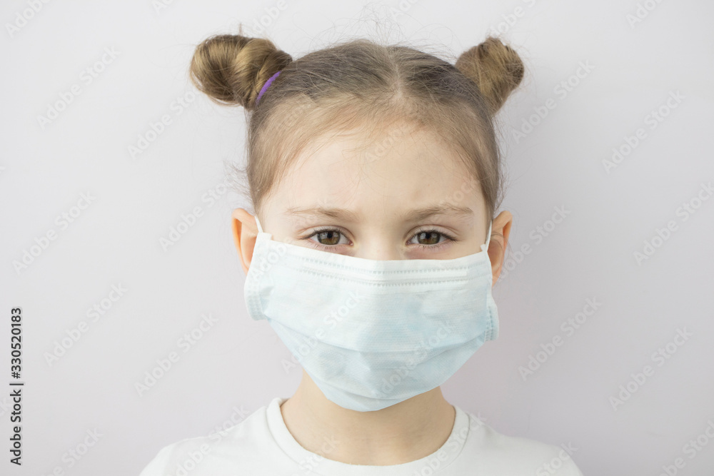 little girl in medical mask, child against pandemic, virus, infection
