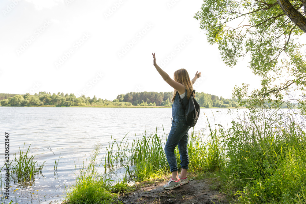 Eco tourism. Teenage girl solo travels against the backdrop of nature, concept of freedom, life, goals, plans. Earth Day, zero waste. Eco tourism. Teenage girl solo travels against the backdrop of nature, concept of freedom, life, goals, plans. Earth Day, zero waste.