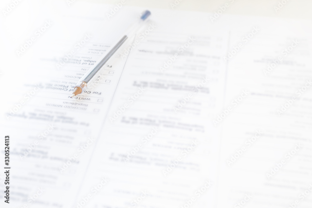 Voting in the Duma elections, president, laws.The pen rests on the ballot paper Voting in the Duma elections, president, laws.The pen rests on the ballot paper