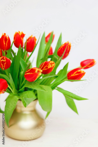 Wallpaper Mural Bouquet of tulips in a vase on a light background Torontodigital.ca