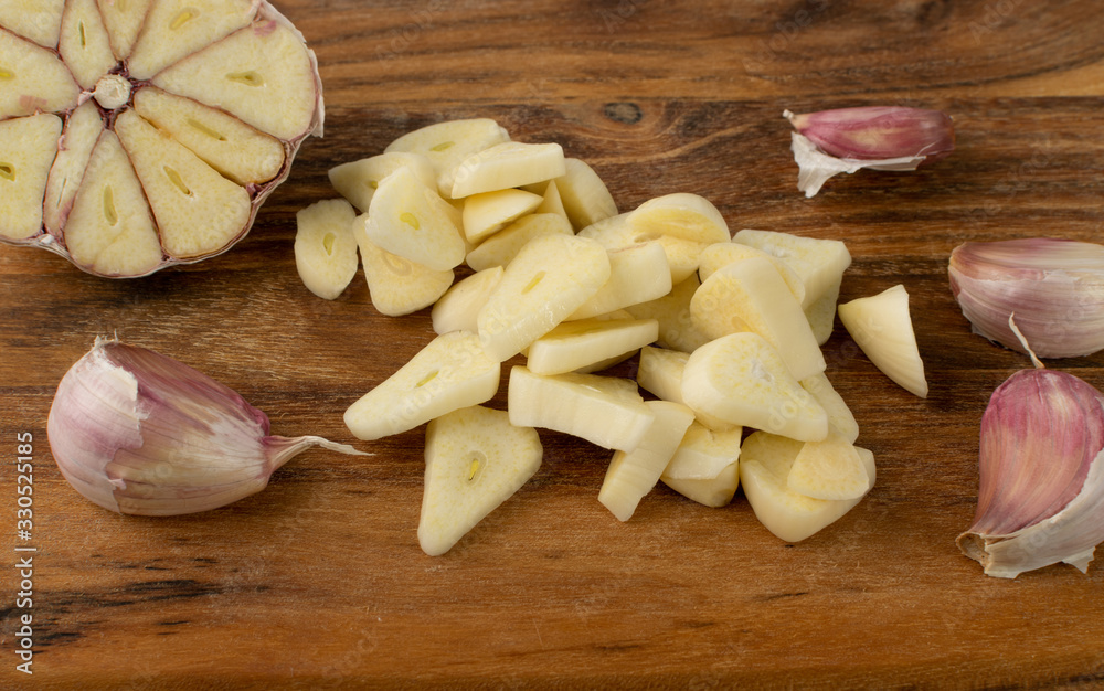 Fresh Garlic Parts Isolated on White Background Fresh Garlic Parts Isolated on White Background