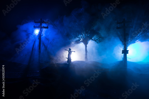 War Concept. Military silhouettes fighting scene on war fog sky background, photo