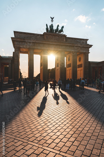 Photography Berlin, Brandenburg gate with tourist in silhouette at sunset