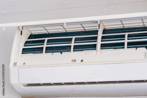 Air conditioner during Maintenance indoor. Cleaning, Washing and Conditioning Service concept