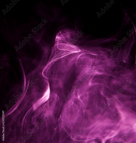 Purple smoke on black background