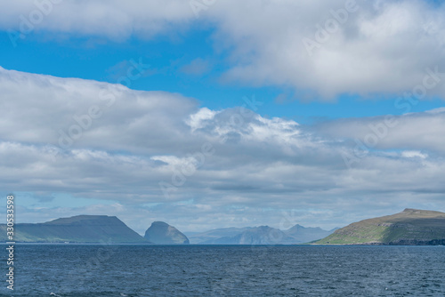 View towards Skopunarfjordur near Kirkjubour in the Faroe Islands on Streymoy island as seen from Smyril ship to Suderoy