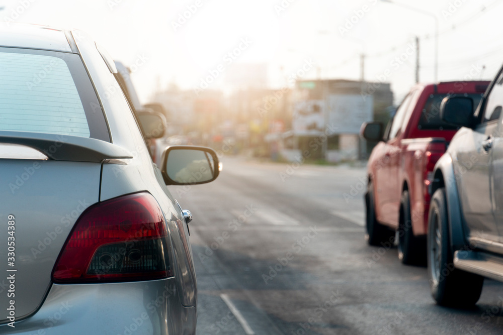 Luxury of car stop on the asphalt junction. Traveling in rural areas with morning light.