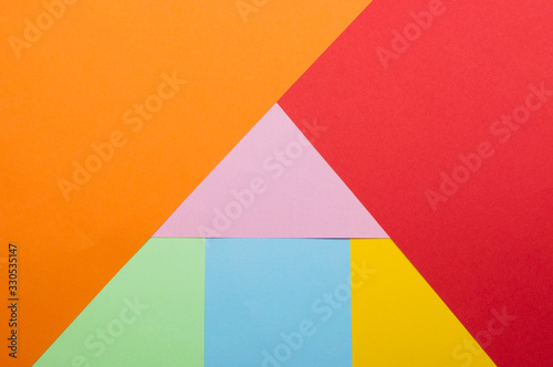 texture of bright abstract shapes of different colors lined with paper
