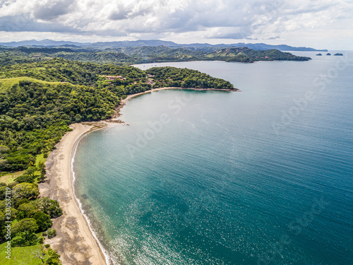 Aerial shot of the tropical beach Playa Arenillas in Costa Rica in peninsula Papagayo coast in guanacaste photo