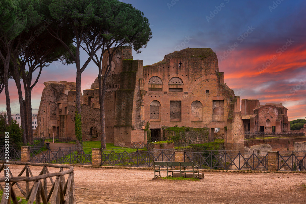 Ruins of the Hippodrome of Domitian in ancient Rome at sunset, Italy