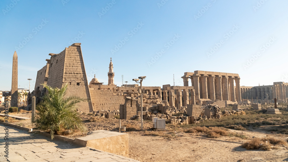 Luxor Temple in Luxor, ancient Thebes, Egypt. Luxor Temple is a large Ancient Egyptian temple complex located on the east bank of the Nile River and was constructed approximately 1400 BCE.