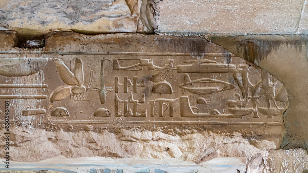 Mysterious symbols on the ceiling beam in the temple of Seti I in Abydos. Tank, Helicopter, Airplane and other vehicles. Egypt.