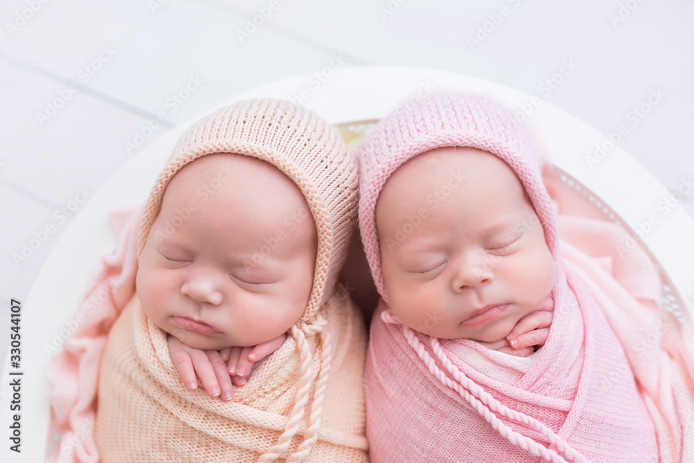 newborn twin girls. first photo session of newborns newborn twin girls. first photo session of newborns