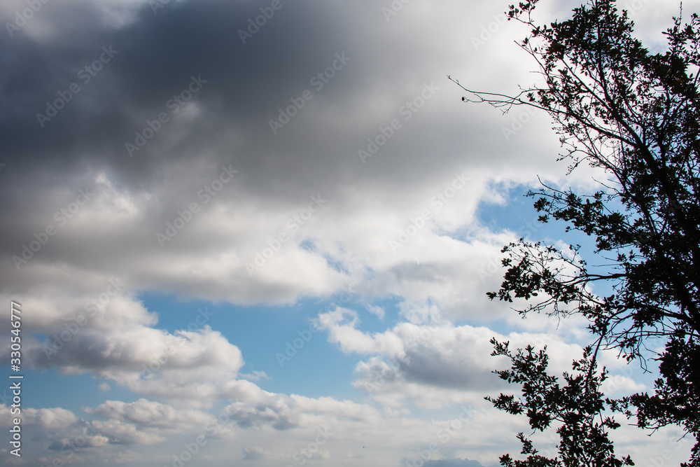 White clouds in a bright blue sky. The beauty of the nature White clouds in a bright blue sky. The beauty of the nature