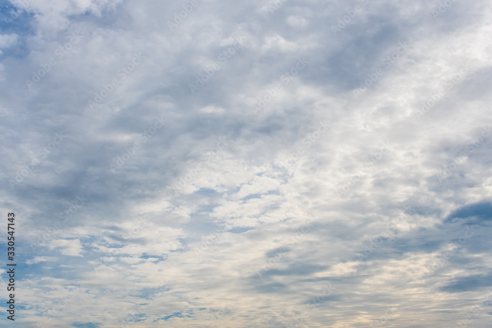 White clouds in a bright blue sky. The beauty of the nature