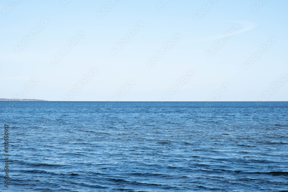 on the horizon exit to the endless blue sea on the horizon exit to the endless blue sea