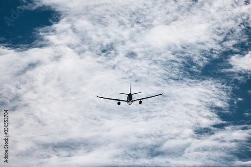 Fototapeta Naklejka Na Ścianę i Meble -  Silhouette of flying airplane