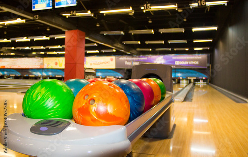 Colorful bowling balls. Multi- colored bowling balls. The equipment for bowling.