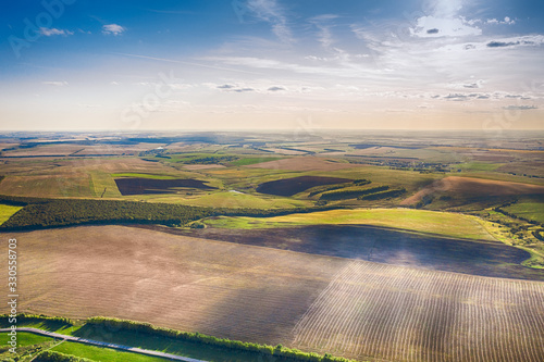 Panorama of agricultural fields aerial view. Soft focus.