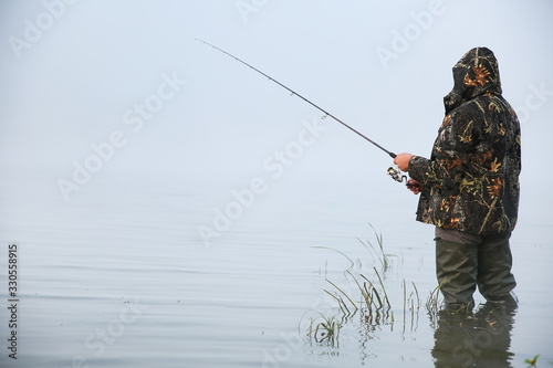 background of fisherman in the fog with copy space