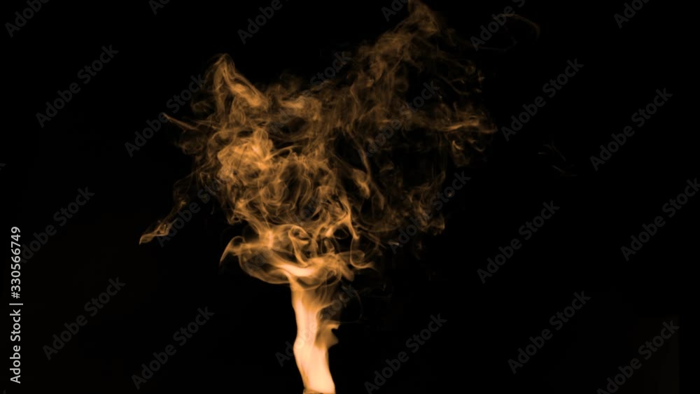 White smoke on a black background. Texture of smoke. Clubs of white smoke on a dark background for an overlay White smoke on a black background. Texture of smoke. Clubs of white smoke on a dark background for an overlay