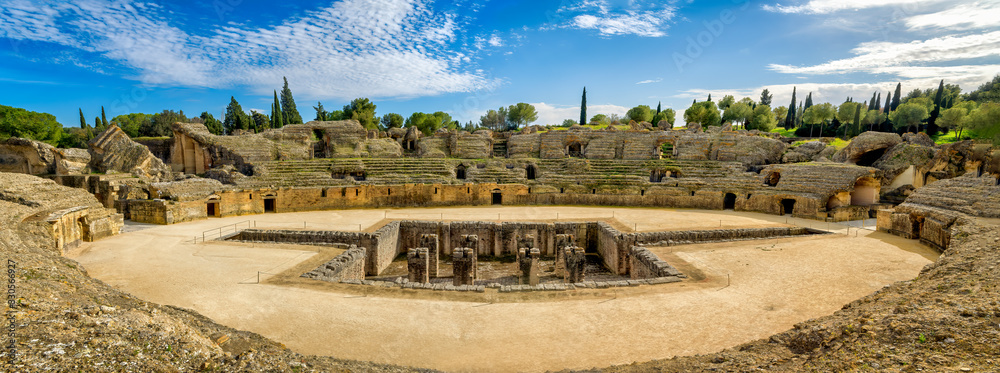 Fototapeta premium Panoramic view of the Roman amphitheater in the ancient town of Italica in Santiponce, Spain.