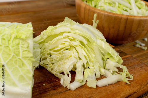 Heap of Chopped Chinese Cabbage, Napa Cabbage or Wombok photo