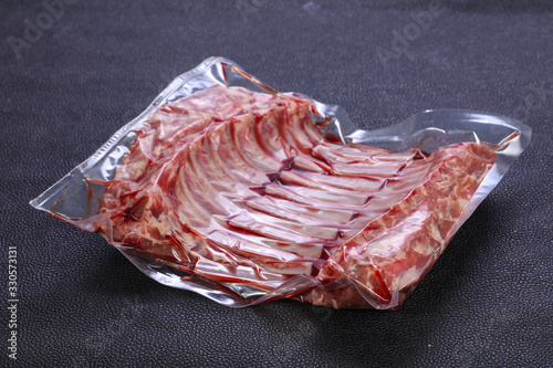 Raw rack of lamb photo