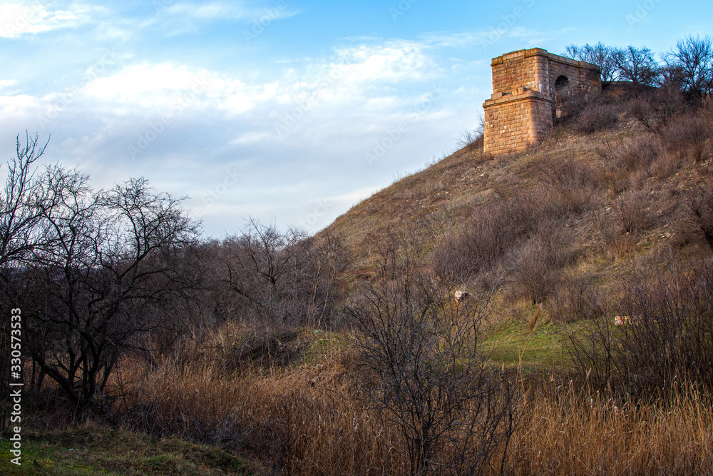 The ruins of an ancient bridge. Landscape. The ruins of an ancient bridge. Landscape.
