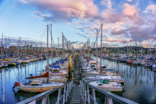 Evening view from the pier to yachts in the cozy port city of Cherbourg-Oktervill (Cherbourg) in the north-west of France. Peninsula of Cotentin, on the coast of the English Channel ( la Manche).