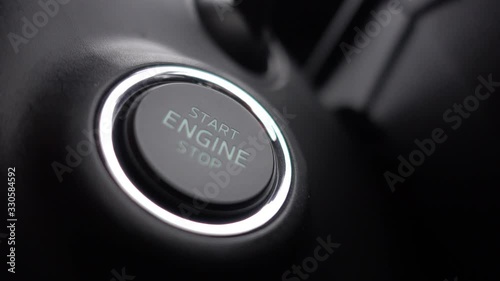 Car driver starting the engine. Auto concept. Close Up.