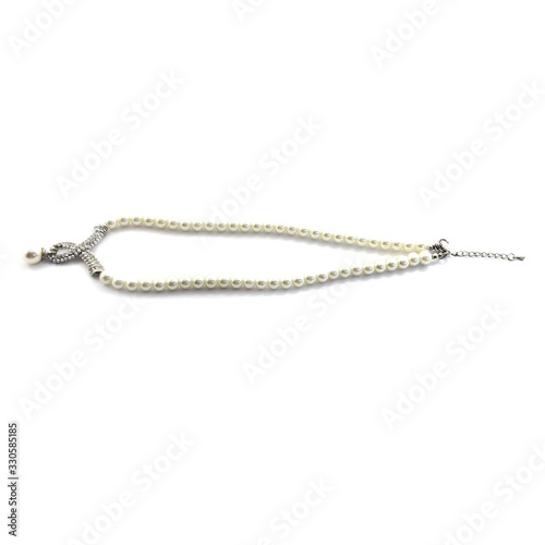 Beads isolated on a white background. Pearl jewelry. Bijouterie. Necklace.