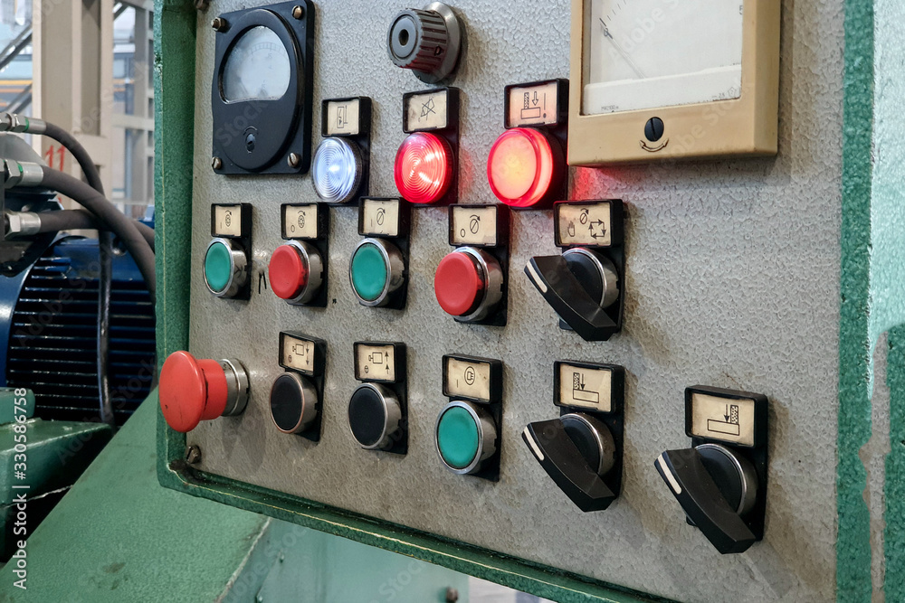 Mechanical control panel of a metalworking machine in production.