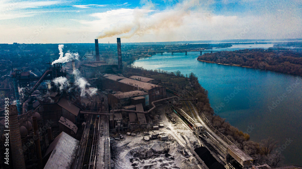 Obraz premium metallurgical production plant full cycle smoke from pipes bad ecology aerial photography