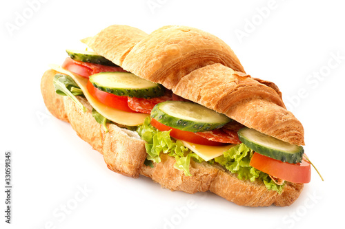 Tasty croissant sandwich on white background
