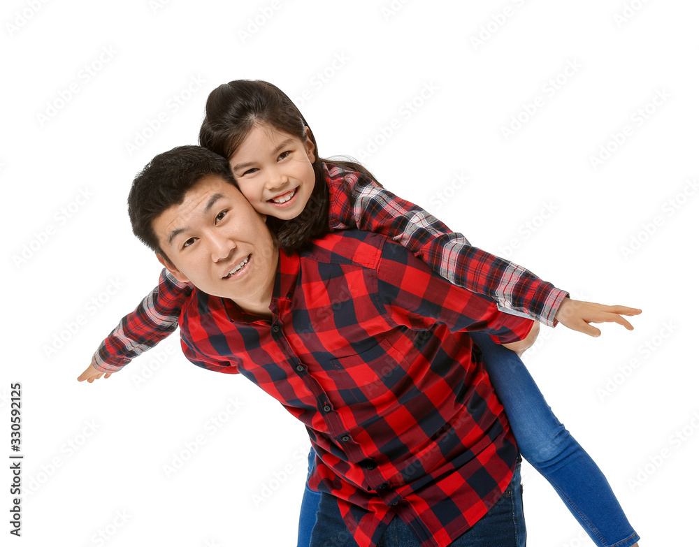 Happy Asian man and his little daughter on white background Happy Asian man and his little daughter on white background