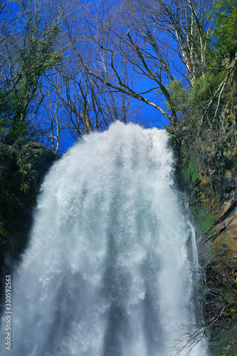 Photo background with a beautiful waterfall in Georgia