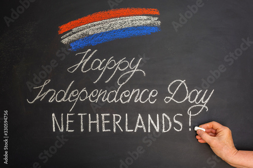 Congratulations on Independence Day of the Netherlands on a chalk board