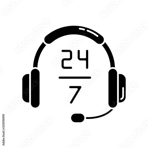 24 7 hour customer support black glyph icon. Headphone sign for around the clock service. 24 hrs call. Helpline twenty four seven hours. Silhouette symbol on white space. Vector isolated illustration