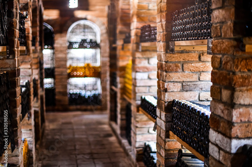 Wine cellar with wine bottles .with space for text.