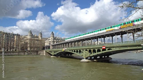 Metro traffic on Pont Bir-Hakeim (Passy viaduc) - Paris, France. Train move from Passy station to Bir-hakeim station.