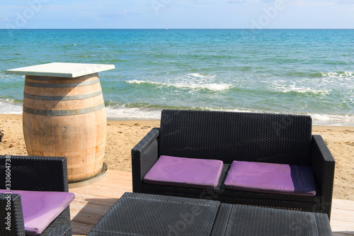 Corsican beach landscape with seats photo