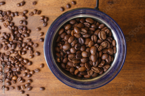coffee beans in an electric coffee grinder