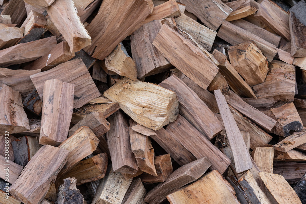 Large amount of firewood in a heap Large amount of firewood in a heap