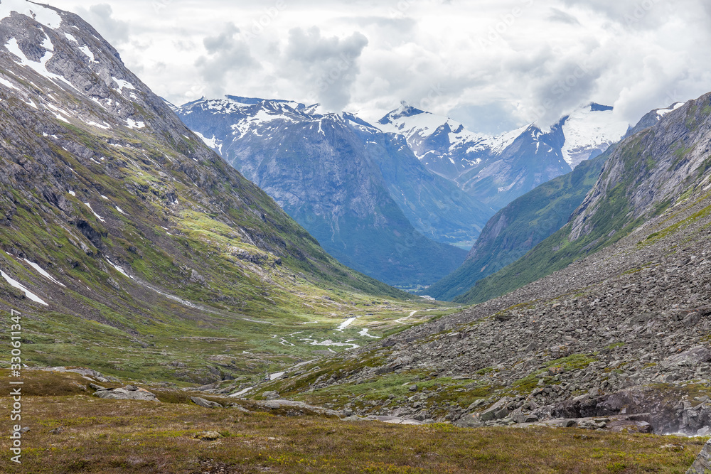 Norway, Beautiful View Of Mountain and Green Valley surrounded by clouds, Norway Mountain Landscape selective focus