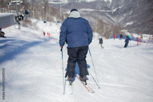 A skier on a slope rides.