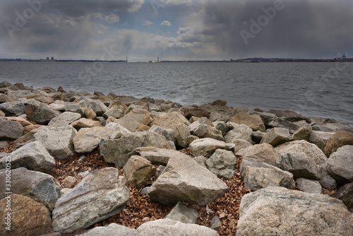 Canvas Print snow squall storm approaching a bridge