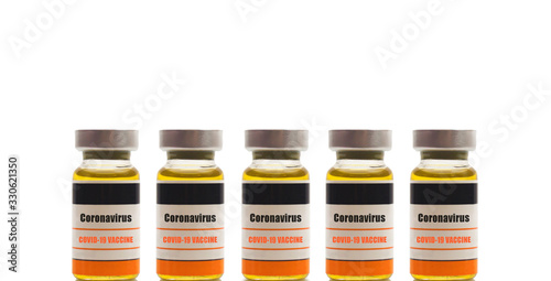 An illustrative concept of a generic unbranded bottle of Coronavirus COVID-19 Vaccine isolated on a white background 