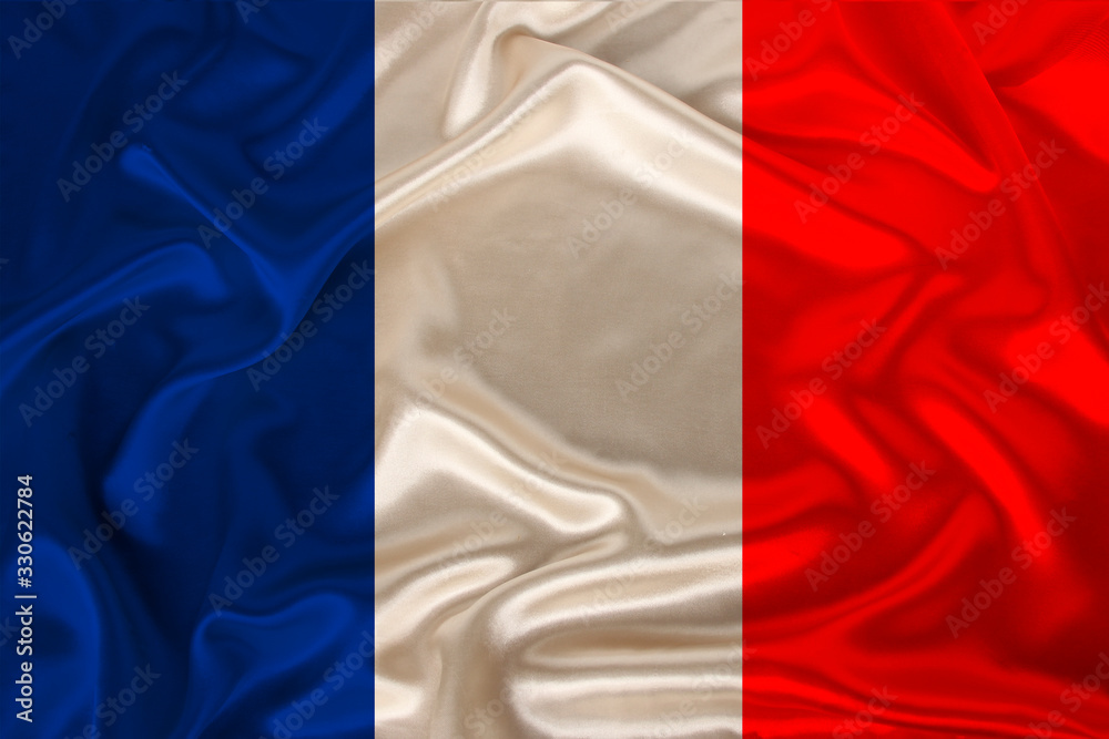 photo of the national flag of France on a luxurious texture of satin, silk with waves, folds and highlights, closeup, copy space, concept of travel, economy and state policy, illustration